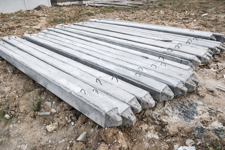concrete piles on ground for house construction foundation の写真素材