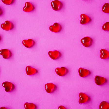 Valentines day background with heart shape candy on pink backgroundの写真素材