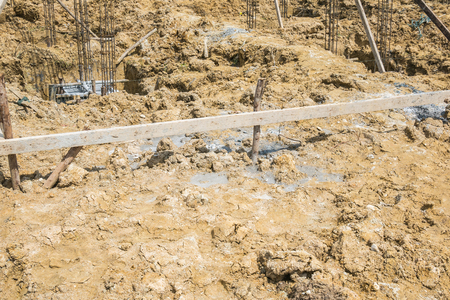 New House building construction site with rebar steel to reinforced concreteの写真素材