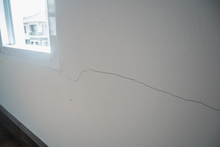 cracked on wall background close upの写真素材