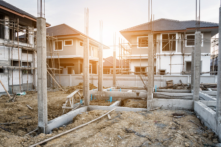 construction residential new house in progress at building siteの写真素材