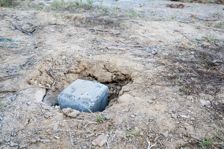 concrete piles in the ground for house construction foundation の写真素材