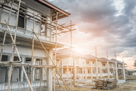 construction residential new house in progress at building siteの写真素材