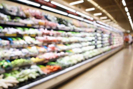 abstract blur organic fresh fruits and vegetable on grocery shelves in supermarket store defocused bokeh light backgroundの写真素材
