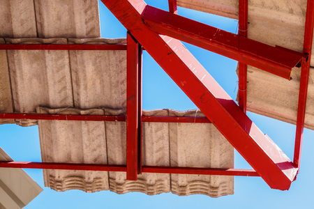 Roof house construction with lots of tile prepare to Installの写真素材