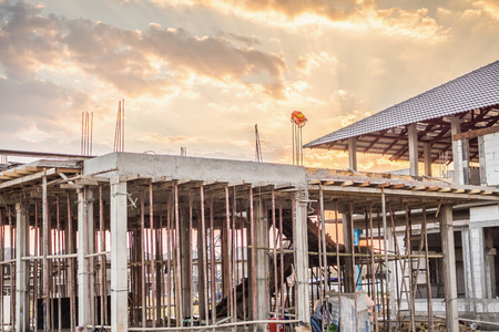 construction residential new house in progress at building siteの写真素材