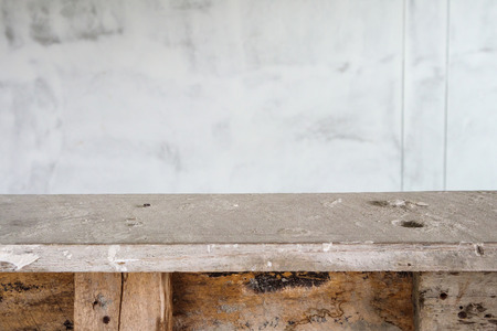 empty wood table at house building construction siteの写真素材