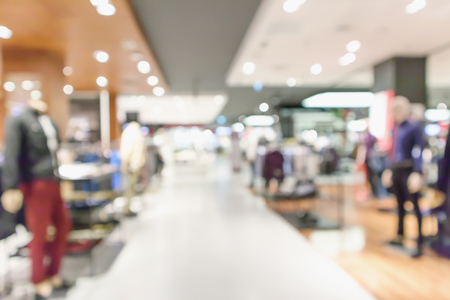 Abstract blur clothing boutique display interior of shopping mall backgroundの写真素材
