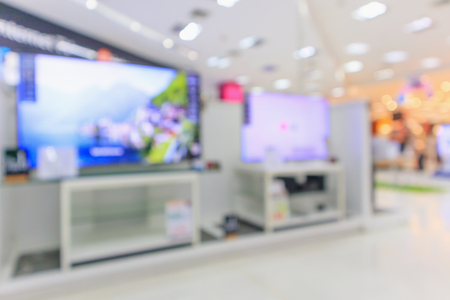 eletronic department store show Television TV and home appliance with bokeh light blurred backgroundの写真素材