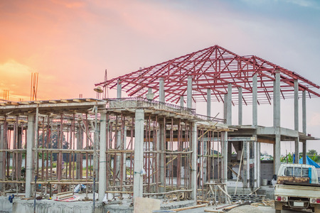construction residential new house in progress at building siteの写真素材