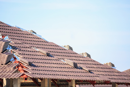 Roof house construction with lots of tile prepare to Installの写真素材