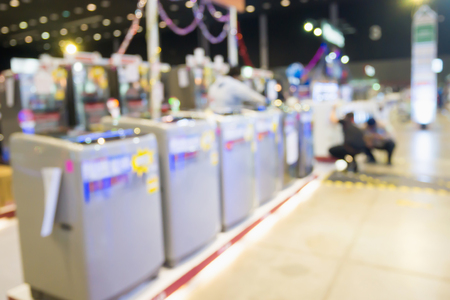 Washing machines in home appliance electronic department retail store blur backgroundの写真素材