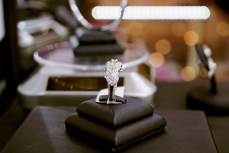 Diamond rings with blank price tag show in jewelry luxury store window display showcaseの写真素材