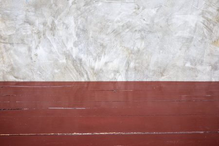 wood table with cement wall backgroundの写真素材