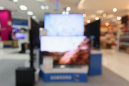 eletronic department store show Television TV and home appliance with bokeh light blurred backgroundの写真素材
