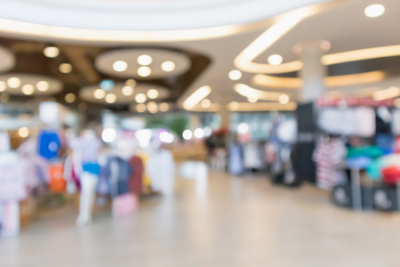 Abstract blur clothing boutique display interior of shopping mall backgroundの写真素材