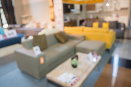 Abstract blur sofa in home decor furniture showroom store interior with bokeh light background for montage product displayの写真素材