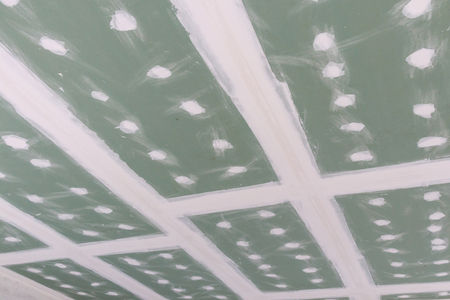 ceiling gypsum board installation at construction siteの写真素材