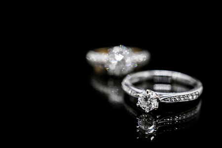Close up Jewelry diamond ring on black background with reflectionの写真素材