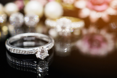 Luxury Jewelry diamond rings with reflection on black backgroundの写真素材