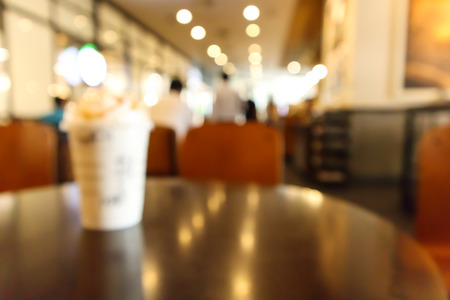 Restaurant cafe or coffee shop interior with people abstract defocused blur backgroundの写真素材