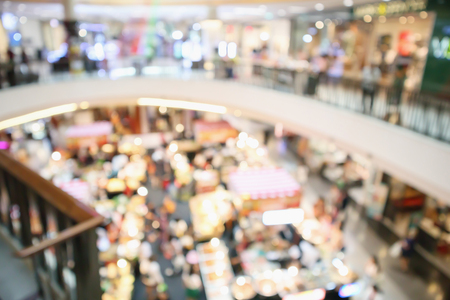 Abstract blur modern shopping mall store interior defocused backgroundの写真素材
