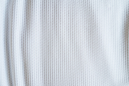 White football jersey clothing fabric texture sports wear background, close upの写真素材