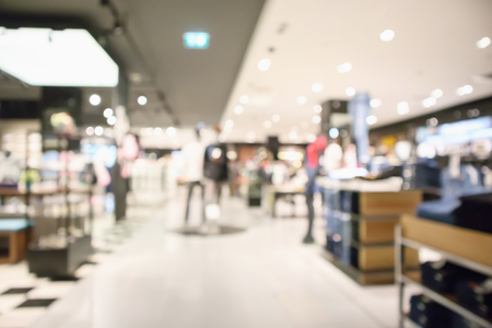 Abstract blur clothing boutique display interior of shopping mall backgroundの写真素材