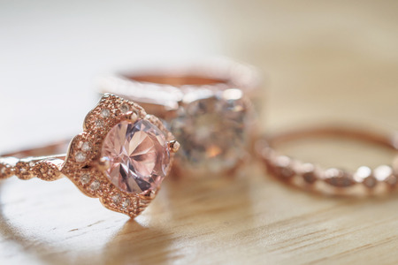 Jewelry pink sapphire rings on wood backgroundの写真素材