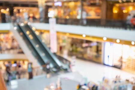 shopping mall interior abstract blur backgroundの写真素材