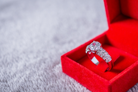 engagement wedding diamond ring in red jewelry gift boxの写真素材