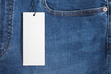 Blue jeans with blank white price label tagの写真素材