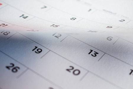 calendar page flipping sheet close up backgroundの写真素材