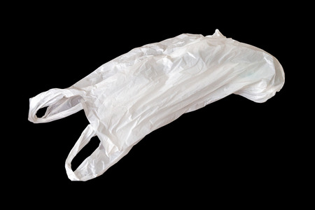 white plastic bag isolated on black backgroundの写真素材