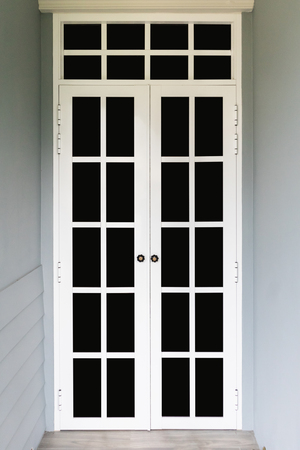 White front door with windowsの写真素材