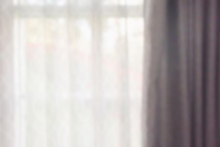 window curtain with green garden abstract blur background