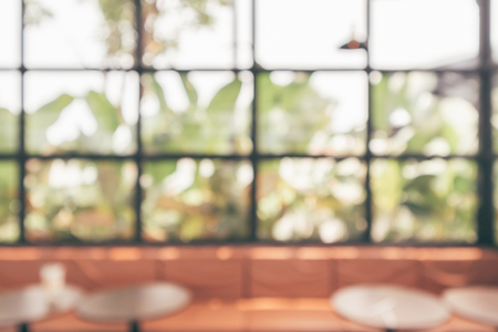 Cafe coffee shop interior abstract blur defocused with bokeh light backgroundの写真素材