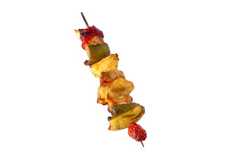 Grilled pork skewer and vegetables barbecue isolated on white backgroundの写真素材