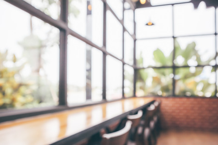 Cafe coffee shop interior abstract blur defocused with bokeh light background