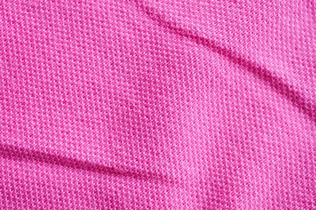 Pink cotton fabric texture closeup backgroundの写真素材