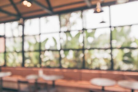 Cafe coffee shop interior abstract blur defocused with bokeh light backgroundの写真素材