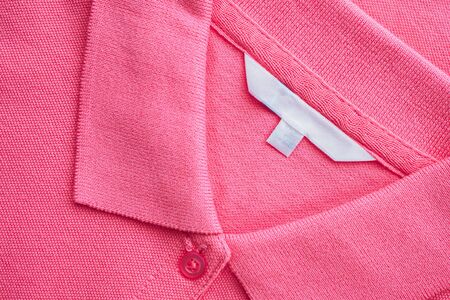 Blank white clothes label on new shirtの写真素材