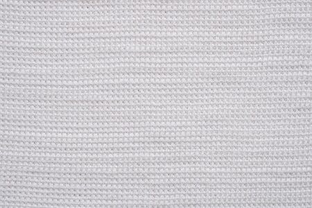 White cotton textile clothing fabric texture backgroundの写真素材