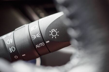 Car light control switch close up