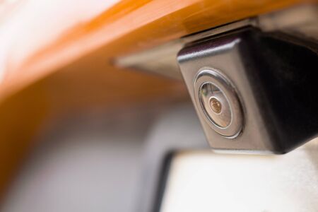 Red car rear view camera close up for parking assistanceの写真素材