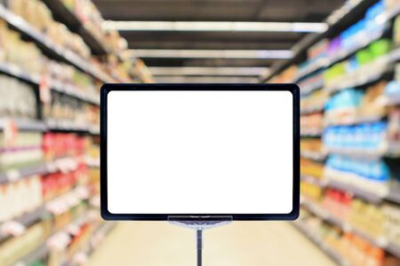 Mock up blank price board poster sign display with supermarket aisle abstract backgroundの写真素材