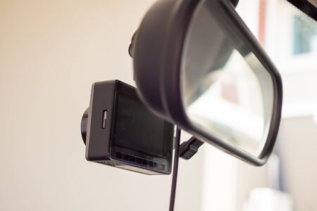 Car CCTV camera video recorder for driving safety on the roadの写真素材