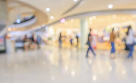 modern luxury shopping mall department store interior blur abstract defocused background with bokeh lightの写真素材