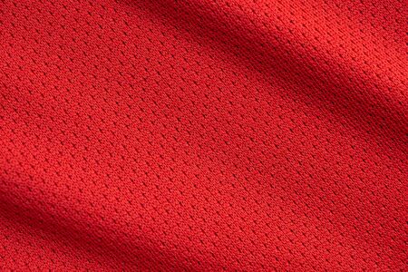 Red sports clothing fabric football jersey texture close upの写真素材