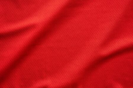 Red sports clothing fabric football jersey texture close up